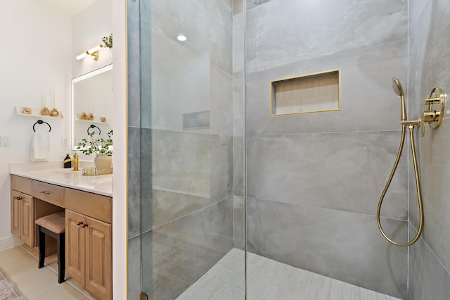 full bathroom with tile patterned flooring, walk in shower, and vanity