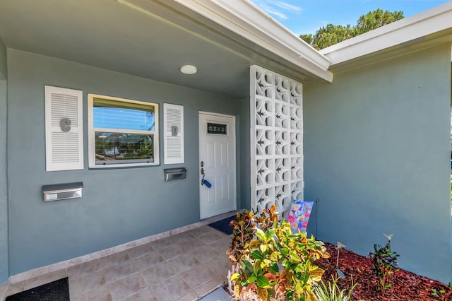 815 Club Dr Unit D, Delray Beach, FL 33445 - property entrance with stucco siding