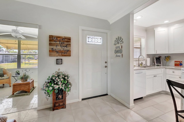 815 Club Dr Unit D, Delray Beach, FL 33445 - foyer featuring ceiling fan, crown molding, baseboards, and light tile patterned floors