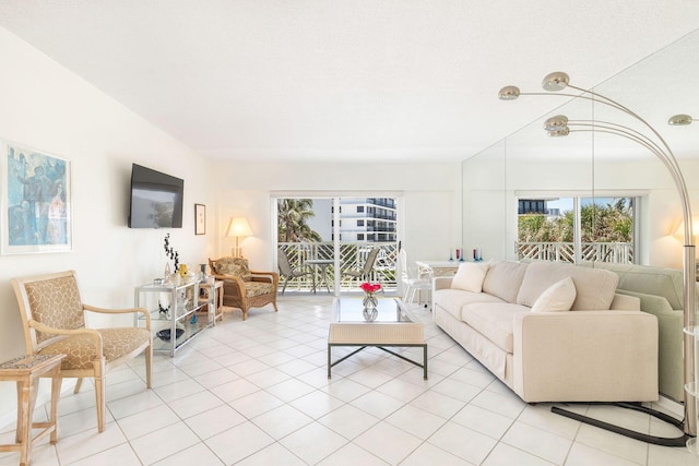 170 N Ocean Blvd Unit 305, Palm Beach, FL 33480 - living area with light tile patterned floors
