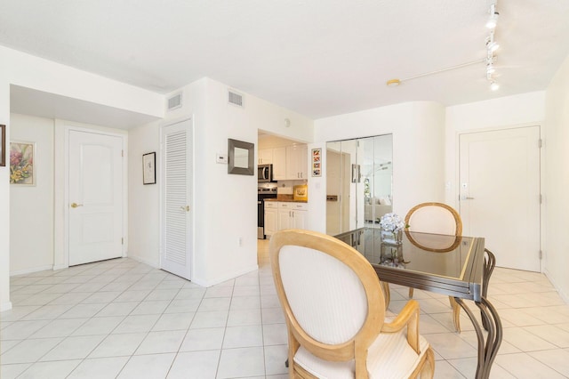 170 N Ocean Blvd Unit 305, Palm Beach, FL 33480 - dining area featuring light tile patterned floors, baseboards, and visible vents