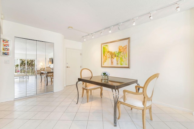 170 N Ocean Blvd Unit 305, Palm Beach, FL 33480 - dining space with light tile patterned floors