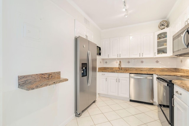 170 N Ocean Blvd Unit 305, Palm Beach, FL 33480 - kitchen featuring glass insert cabinets, light stone countertops, white cabinets, visible vents, and appliances with stainless steel finishes