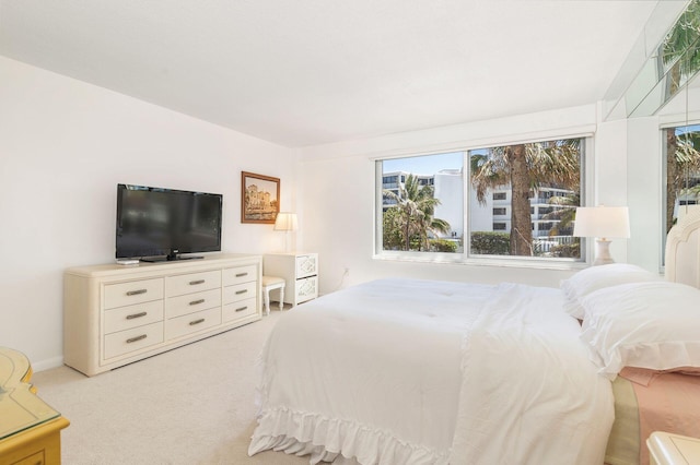 170 N Ocean Blvd Unit 305, Palm Beach, FL 33480 - bedroom with light colored carpet and multiple windows