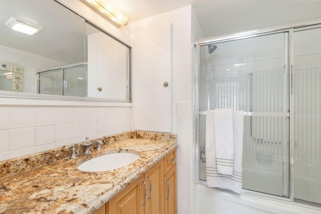 170 N Ocean Blvd Unit 305, Palm Beach, FL 33480 - bathroom with vanity and enclosed tub / shower combo