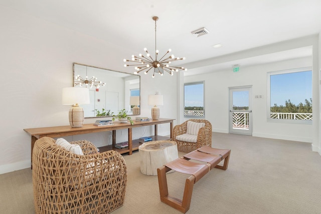 170 N Ocean Blvd Unit 305, Palm Beach, FL 33480 - living area with visible vents, baseboards, an inviting chandelier, and carpet floors