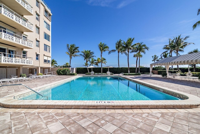 170 N Ocean Blvd Unit 305, Palm Beach, FL 33480 - community pool featuring a patio area