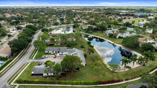6117 Woodlake Blvd, Greenacres, FL 33463 - aerial view of property and surrounding area with a large body of water and nearby suburban area