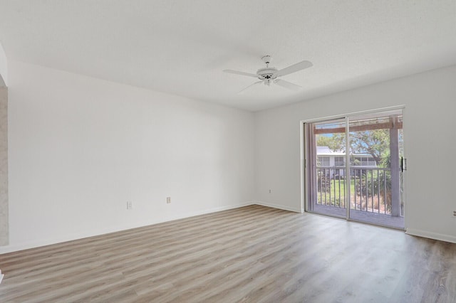 1852 SW Palm City Rd Unit 202, Stuart, FL 34994 - spare room featuring light wood finished floors and ceiling fan