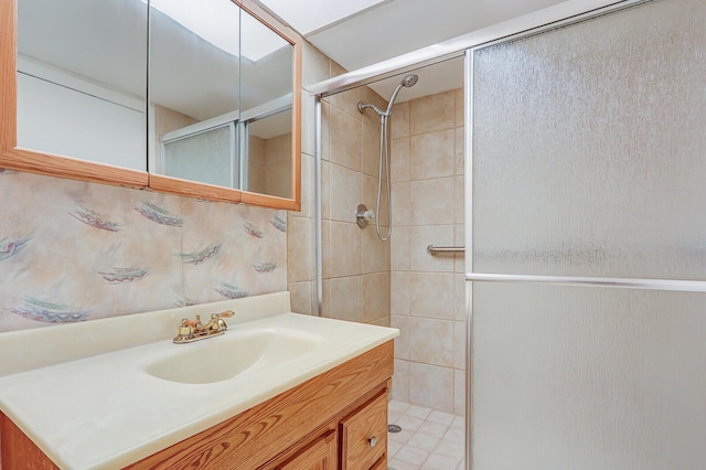 1852 SW Palm City Rd Unit 202, Stuart, FL 34994 - bathroom featuring tiled shower and vanity