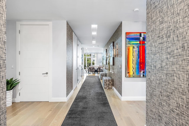 3200 S Ocean Blvd Unit 101, Highland Beach, FL 33487 - hall with light wood-style floors and baseboards