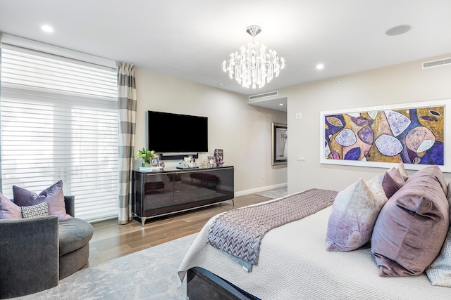 3200 S Ocean Blvd Unit 101, Highland Beach, FL 33487 - bedroom with wood finished floors, a chandelier, recessed lighting, and baseboards