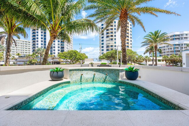 3200 S Ocean Blvd Unit 101, Highland Beach, FL 33487 - view of pool featuring an in-ground hot tub