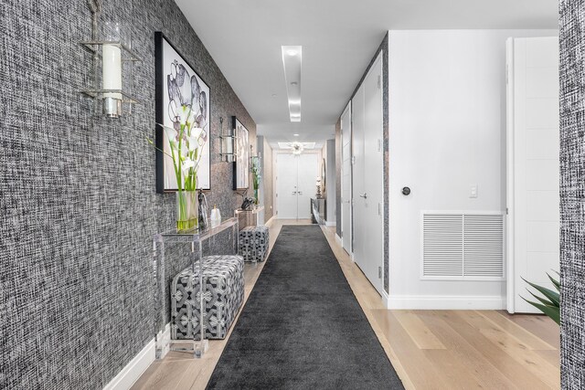 3200 S Ocean Blvd Unit 101, Highland Beach, FL 33487 - hallway with wood finished floors