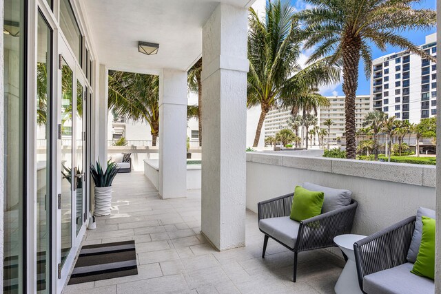 3200 S Ocean Blvd Unit 101, Highland Beach, FL 33487 - view of patio / terrace with a balcony