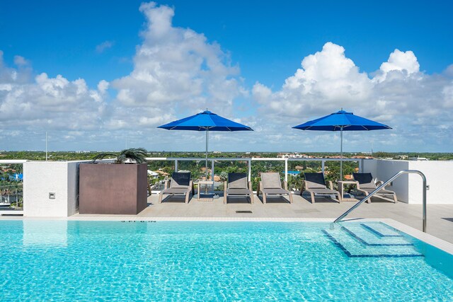 3200 S Ocean Blvd Unit 101, Highland Beach, FL 33487 - community pool with a patio