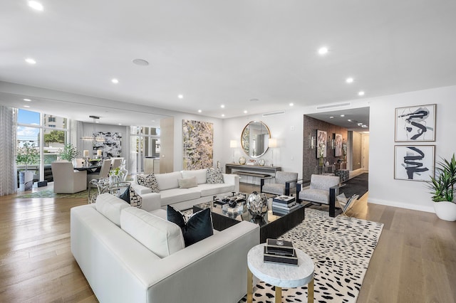 3200 S Ocean Blvd Unit 101, Highland Beach, FL 33487 - living room with recessed lighting, wood finished floors, and baseboards