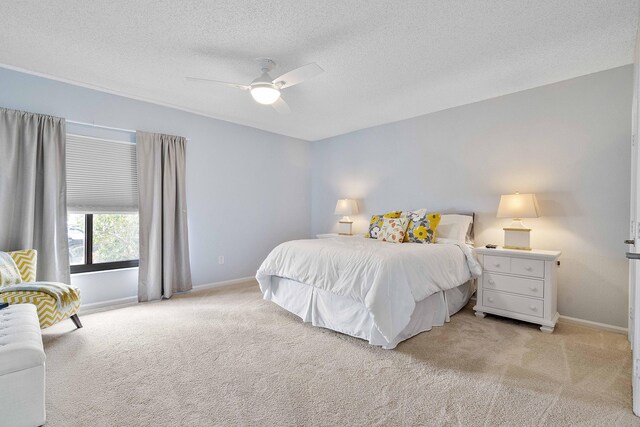 22652 Esplanada Cir W, Boca Raton, FL 33433 - bedroom featuring carpet, a textured ceiling, baseboards, and ceiling fan