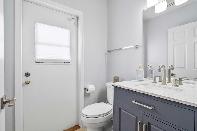 22652 Esplanada Cir W, Boca Raton, FL 33433 - bathroom featuring vanity and toilet