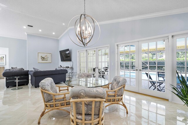 22652 Esplanada Cir W, Boca Raton, FL 33433 - dining space featuring french doors, ornamental molding, a chandelier, recessed lighting, and vaulted ceiling