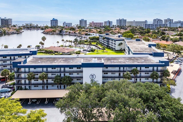 aerial view with a city view and a water view