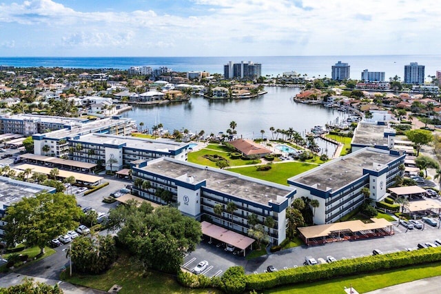 drone / aerial view with a water view and a view of city