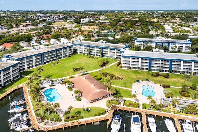 birds eye view of property featuring a water view