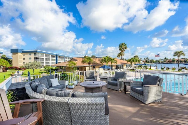 view of patio / terrace with a community pool and an outdoor hangout area