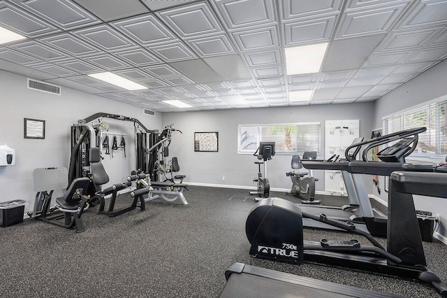 gym featuring visible vents and baseboards
