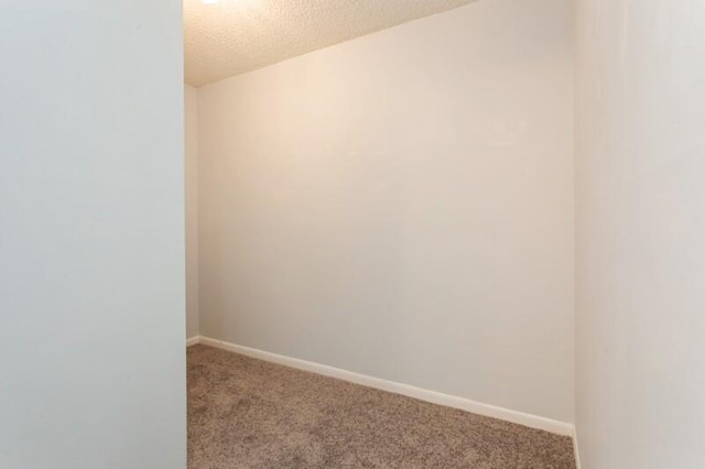701 Sabal Ridge Cir Unit C, Palm Beach Gardens, FL 33418 - carpeted spare room featuring baseboards