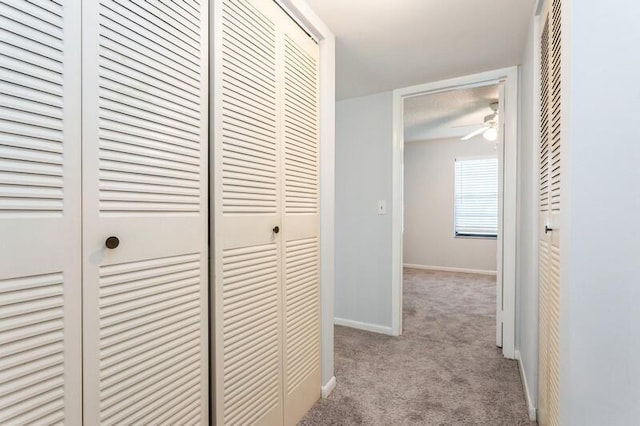 701 Sabal Ridge Cir Unit C, Palm Beach Gardens, FL 33418 - hallway featuring carpet floors and baseboards
