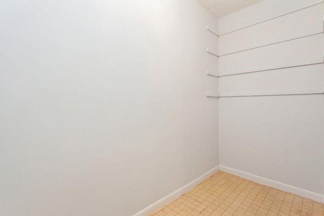 701 Sabal Ridge Cir Unit C, Palm Beach Gardens, FL 33418 - unfurnished room featuring baseboards