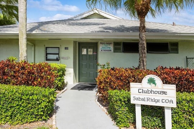 701 Sabal Ridge Cir Unit C, Palm Beach Gardens, FL 33418 - entrance to property featuring roof with shingles and stucco siding