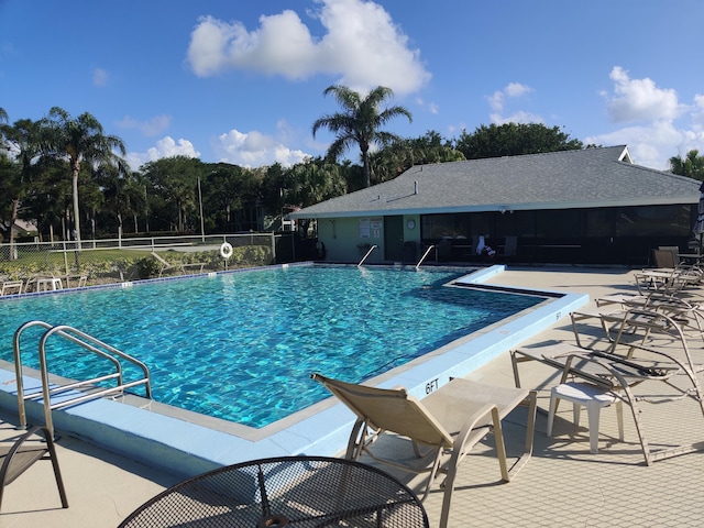 701 Sabal Ridge Cir Unit C, Palm Beach Gardens, FL 33418 - community pool with a patio area and view of scattered trees