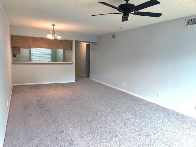 701 Sabal Ridge Cir Unit C, Palm Beach Gardens, FL 33418 - unfurnished living room with a chandelier, carpet floors, ceiling fan, a textured ceiling, and baseboards