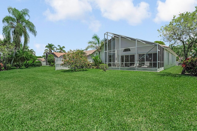 9703 Harbour Lake Cir, Boynton Beach, FL 33437 - view of grassy yard featuring a lanai