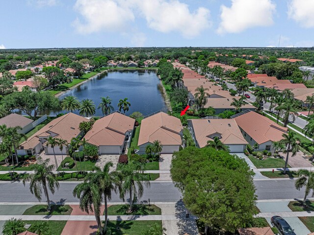 9703 Harbour Lake Cir, Boynton Beach, FL 33437 - view of swimming pool with a lawn and a water view