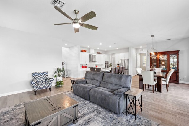 1104 Wandering Willow Way, Loxahatchee, FL 33470 - living area with ceiling fan, light wood-style floors, recessed lighting, baseboards, and visible vents