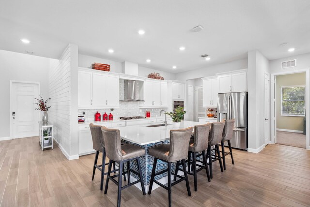 1104 Wandering Willow Way, Loxahatchee, FL 33470 - dining area featuring visible vents, light wood-style flooring, baseboards, and recessed lighting