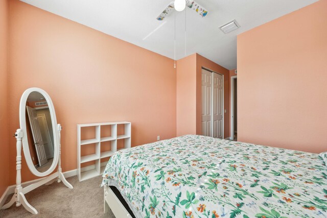 1104 Wandering Willow Way, Loxahatchee, FL 33470 - bedroom with visible vents, a ceiling fan, a closet, baseboards, and carpet flooring