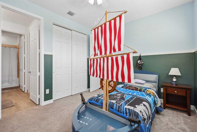 1104 Wandering Willow Way, Loxahatchee, FL 33470 - bedroom with a ceiling fan, visible vents, baseboards, a closet, and carpet