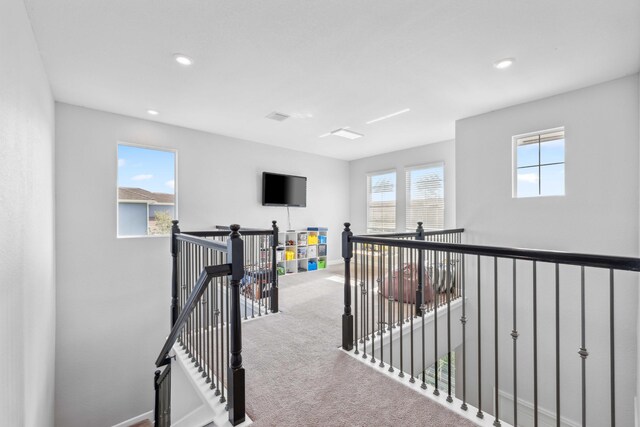 1104 Wandering Willow Way, Loxahatchee, FL 33470 - hall with baseboards, carpet flooring, recessed lighting, and an upstairs landing