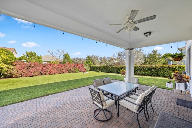 1104 Wandering Willow Way, Loxahatchee, FL 33470 - view of patio / terrace with outdoor dining area and a ceiling fan