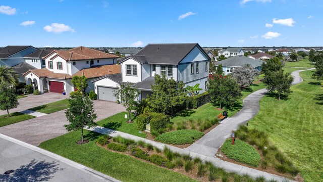1104 Wandering Willow Way, Loxahatchee, FL 33470 - aerial view featuring a residential view