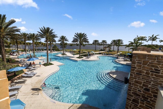 1104 Wandering Willow Way, Loxahatchee, FL 33470 - pool with a patio area