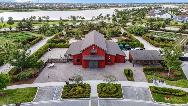 1104 Wandering Willow Way, Loxahatchee, FL 33470 - birds eye view of property featuring a water view