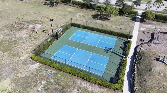 1104 Wandering Willow Way, Loxahatchee, FL 33470 - view of sport court featuring fence
