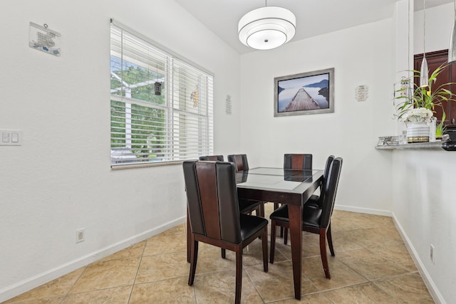 1070 Grove Park Cir, Boynton Beach, FL 33436 - dining room with baseboards and light tile patterned floors