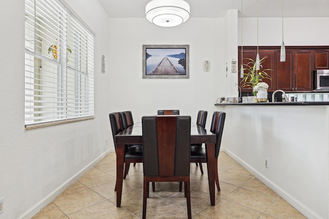 1070 Grove Park Cir, Boynton Beach, FL 33436 - dining room featuring baseboards and light tile patterned floors
