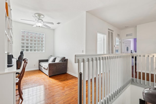 1070 Grove Park Cir, Boynton Beach, FL 33436 - interior space with baseboards, a ceiling fan, wood finished floors, and visible vents